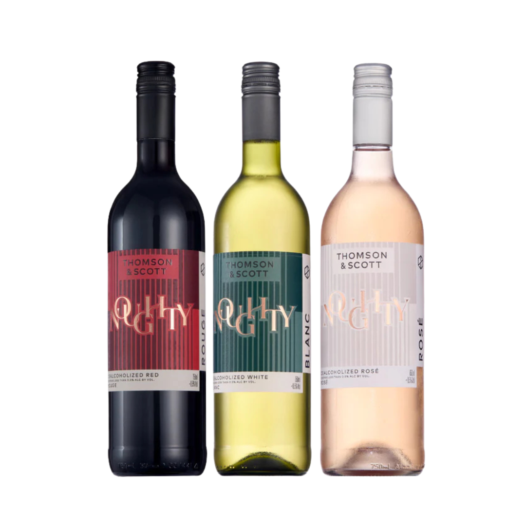 Three bottles of Thomson & Scott wine, one red, one white, and one rosé, on a white background.