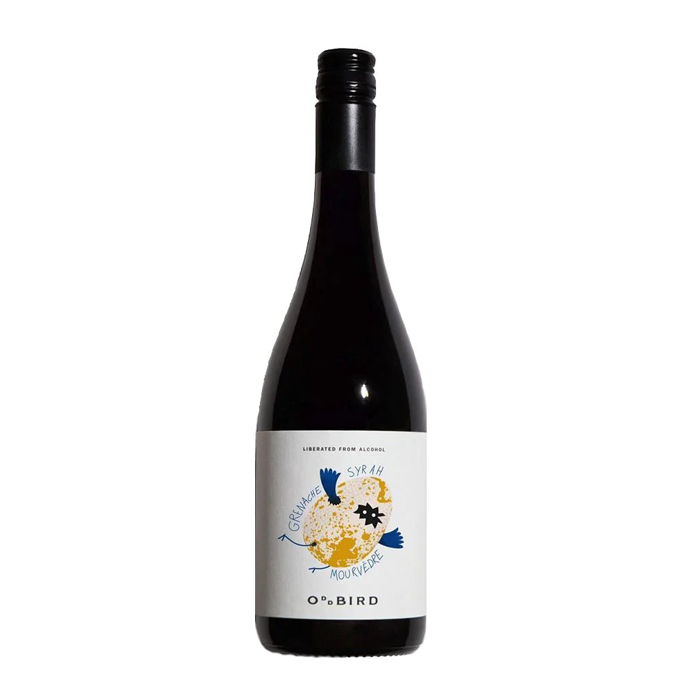 Oddbird GSM Non-Alcoholic Red Wine Bottle – Grenache, Syrah, Mourvèdre Blend. Premium alcohol-free red wine with a modern label featuring a golden egg with blue wings and feet flying through the air. Screw cap bottle with ‘Liberated from Alcohol’ text on the label.