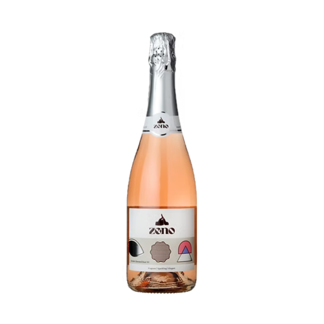 ZENO Sparkling Rosé non-alcoholic wine bottle with gold foil top and modern white label, in a clear bottle displayed on a white background.