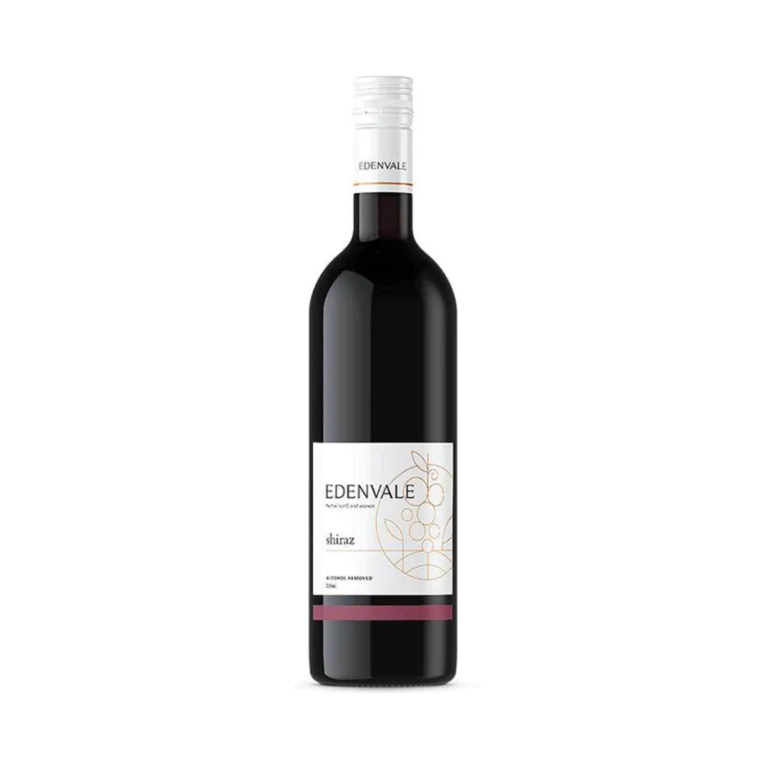 A bottle of Edenvale Shiraz non-alcoholic wine with a label showing the brand and the type of wine.