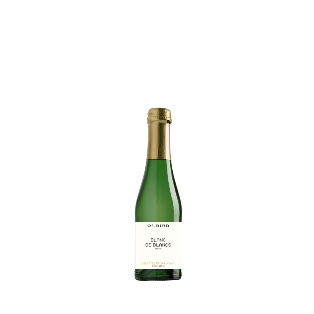 Green wine bottle with gold cap on a white background